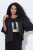 Ulla Popken 842712 Kort blazer med bindebånd og flæseærmer Sort - Blazere - Blazere i plusstørrelser til kvinder